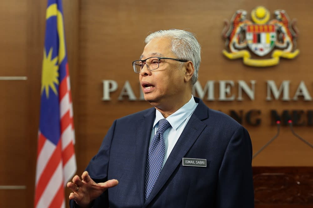 Senior Minister Datuk Seri Ismail Sabri Yaakob speaks to reporters at Parliament in Kuala Lumpur July 23, 2020. — Picture by Yusof Mat Isa