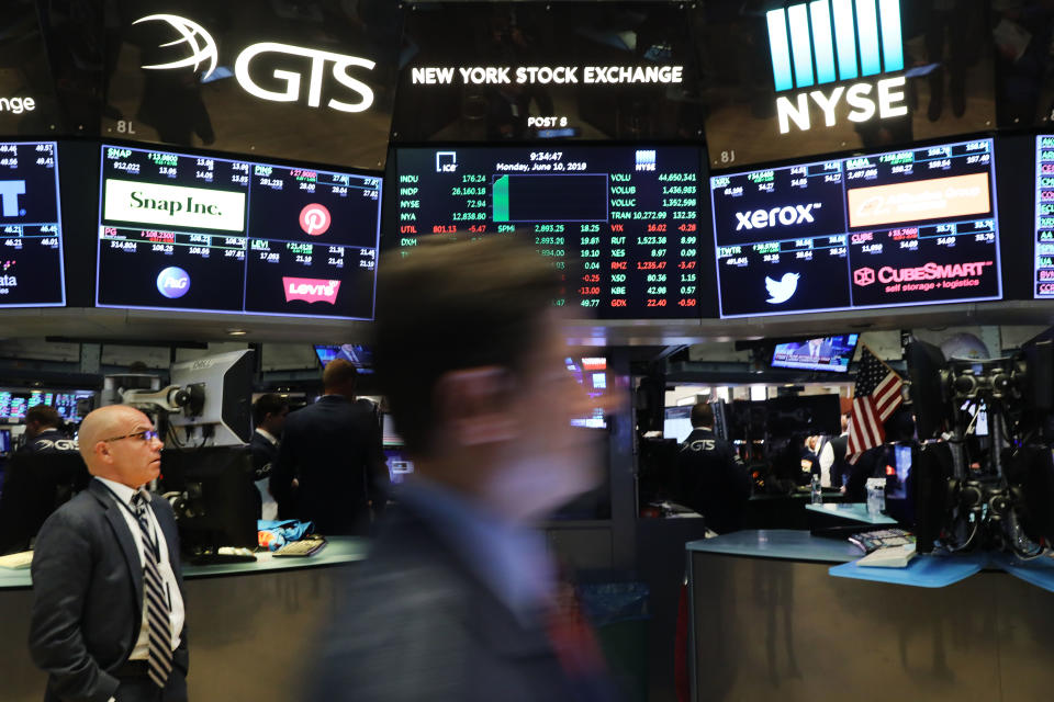 NEW YORK, NEW YORK - JUNE 10: Traders work on the floor of the New York Stock Exchange (NYSE) on June 10, 2019 in New York City. Following news that the Trump administration and the Mexican government have come to an agreement over border strategy and tariffs, the market rose over 100 points in morning trading.  (Photo by Spencer Platt/Getty Images)