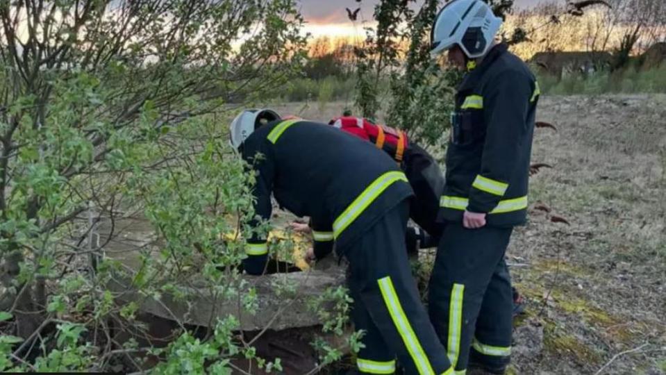 Rescuers at the well