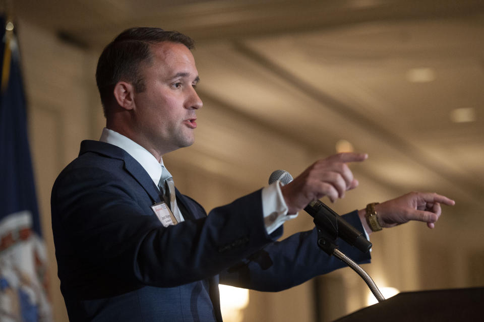 FILE - In this Sept. 1, 2021 file photo, Virginia Republican Lt. Governor candidate Jason Miyares addresses the Virginia FREE Leadership Luncheon in McLean, Va. Seeking a third term as Virginia's attorney general, Democrat Mark Herring proudly touts a progressive record that includes defending gay marriage, gun control and criminal justice reform. Miyares, Herring's opponent in next month’s elections, looks at that same record in disgust, calling it part of the “far-left monopoly that’s been happening in Richmond the last few years.” (AP Photo/Cliff Owen, File)