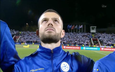 Kosovo players during their anthem - Credit: ITV