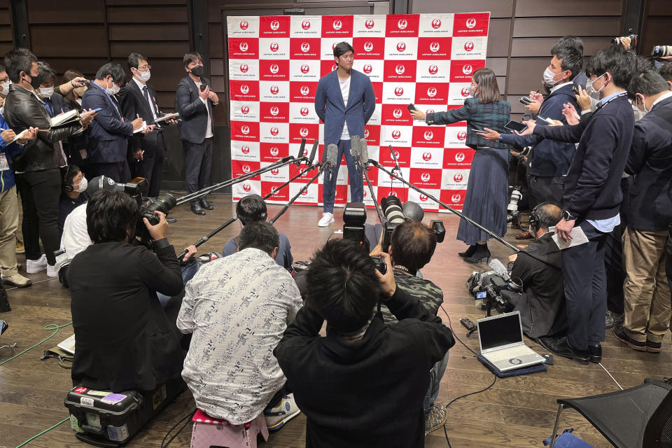 Los Angeles Angels' Shohei Ohtani speaks to reporters after he returned home, at the Haneda international airport in Tokyo, Japan, Tuesday, Oct. 18, 2022. (AP Photo/Koji Ueda)