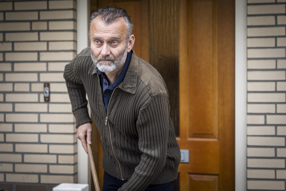 Hugh Dennis as a nosey neighbour in The Couple Next Door.