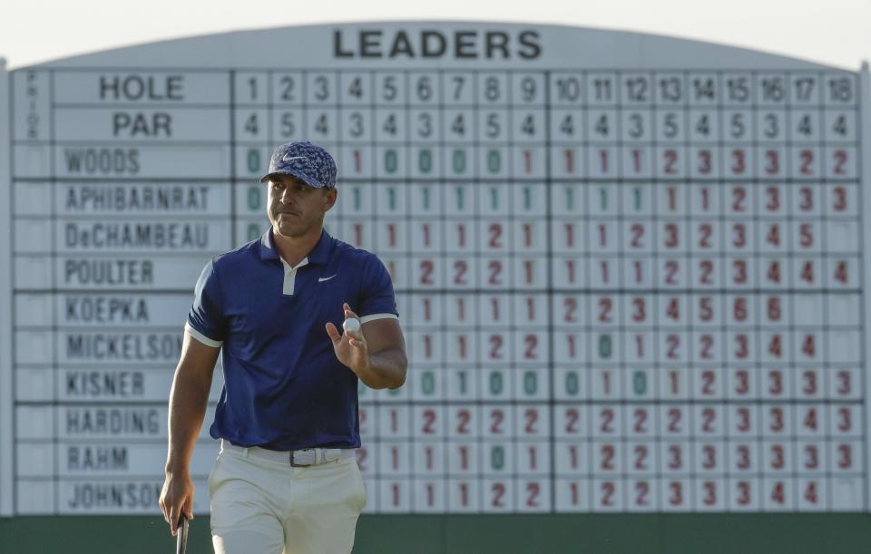 Brooks Koepka walks on the 17th hole during the first round for the Masters golf tournament Thursday, April 11, 2019, in Augusta, Ga. (AP Photo/Charlie Riedel)