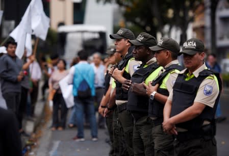 People protest against Ecuador's President Lenin Moreno's austerity measures, in Guayaquil