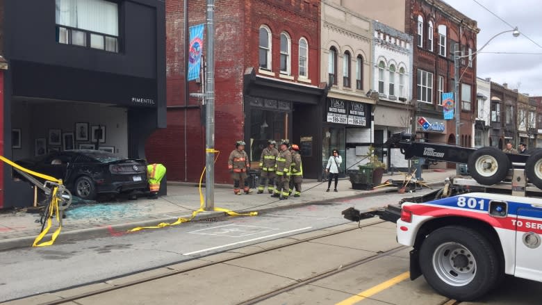 Driver smashes into Dundas West photo studio, causing gas leak and road closure