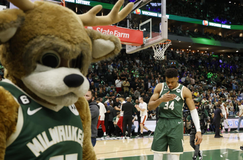 Milwaukee Bucks forward Giannis Antetokounmpo (34) reacts on the floor at the start of the first half of Game 5 in a first-round NBA basketball playoff series Wednesday, April 26, 2023, in Milwaukee. (AP Photo/Jeffrey Phelps)