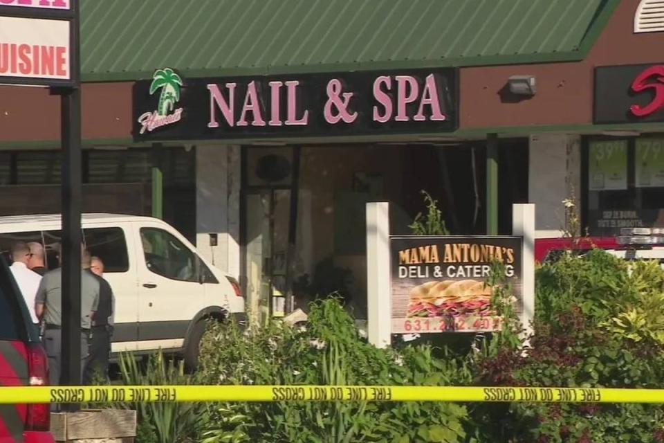 Police and EMS personnel gather outside of a nail salon in Deer Park, New York, on Friday, June 28, 2024, where a minivan crash through a wall and killed four people (FOX5)