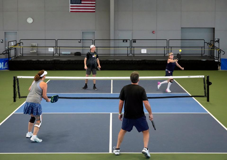 Pickleball players compete in the gold medal round during the Pictona "Singles Mingle" event in February at Pictona in Holly Hill. The complex, which offers 49 outdoor and indoor courts, has become an internationally known hot-spot for the sport since it opened in 2020.