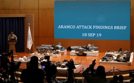 FILE PHOTO: Saudi defence ministry spokesman Colonel Turki Al-Malik displays remains of the missiles which Saudi government says were used to attack an Aramco oil facility, during a news conference in Riyadh