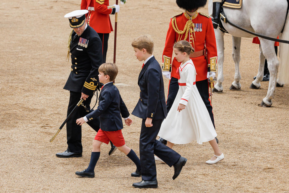 LONDON, ENGLAND - JUNE 17: Prince George of Wales, Princess Charlotte of Wales and Prince Louis of Wales walk from a horse drawn carriage during Trooping the Colour at Horse Guards Parade on June 17, 2023 in London, England. Trooping the Colour is a traditional parade held to mark the British Sovereign's official birthday. It will be the first Trooping the Colour held for King Charles III since he ascended to the throne. (Photo by Rob Pinney/Getty Images)
