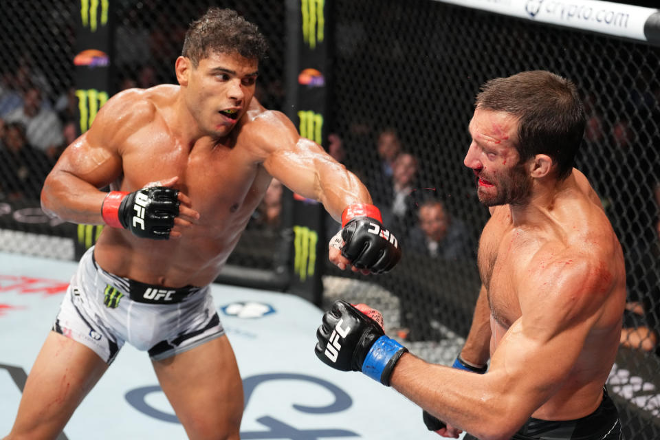 SALT LAKE CITY, UTAH - AUGUST 20: (L-R) Paulo Costa of Brazil punches Luke Rockhold in a middleweight fight during the UFC 278 event at Vivint Arena on August 20, 2022 in Salt Lake City, Utah. (Photo by Josh Hedges/Zuffa LLC)