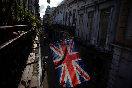 A British flag is displayed outside a restaurant in downtown Havana, Cuba, March 20, 2019. REUTERS/Alexandre Meneghini