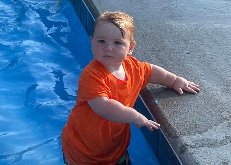 Cabe Idol, 1, isn’t sure about the pool but he seems to be holding his own at the summer pool party hosted by Beaver Ridge United Methodist Church held at the Karns Lions Club Community Pool Saturday, July 16, 2022.