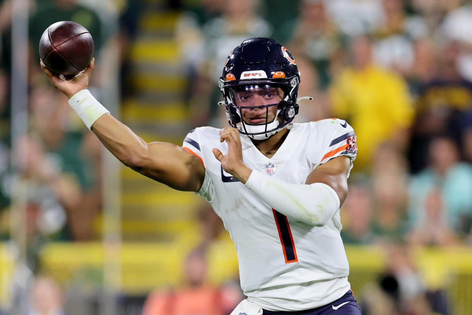 GREEN BAY, WISCONSIN - SEPTEMBER 18: Justin Fields #1 of the Chicago Bears throws a pass during the second quarter in the game against the Green Bay Packers at Lambeau Field on September 18, 2022 in Green Bay, Wisconsin. (Photo by Michael Reaves/Getty Images)