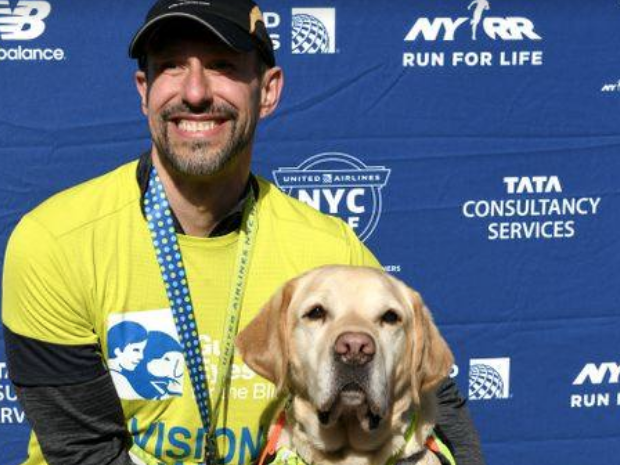 Blind man makes history by finishing New York City Half Marathon aided only by dogs