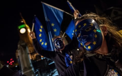 A small group of pro European Union supporters demonstrate outside the Houses of Parliament - Credit: Chris J Ratcliffe/Getty