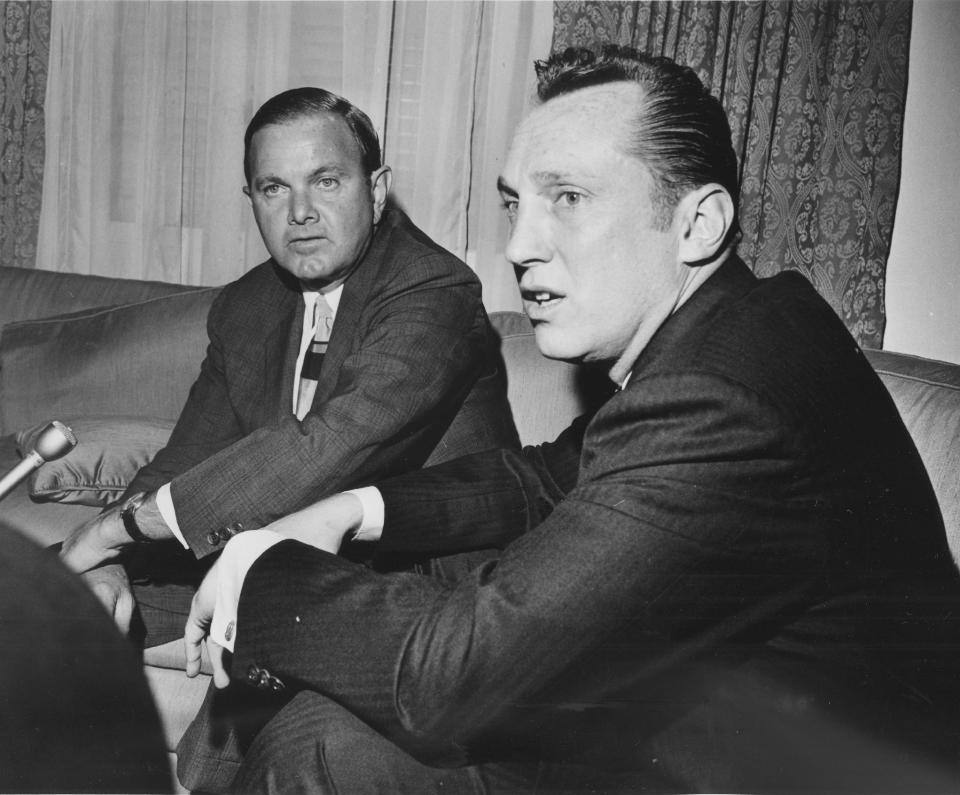 FILE - In this April 1966, file photo, Al Davis, right, the head coach-general manager of the Oakland Raiders, was named the new American Football League Commissioner in Houston by Ralph Wilson, left, President of the AFL and owner of the Buffalo Bills. Bills owner Wilson Jr. has died at the age of 95. NFL.com says team president Russ Brandon announced his death at the league's annual meeting in Orlando, Fla., Tuesday, March 25, 2014. He was one of the original founders of the American Football League and owned the Bills for the last 54 years. (AP Photo/Ed Kolenovsky, File)