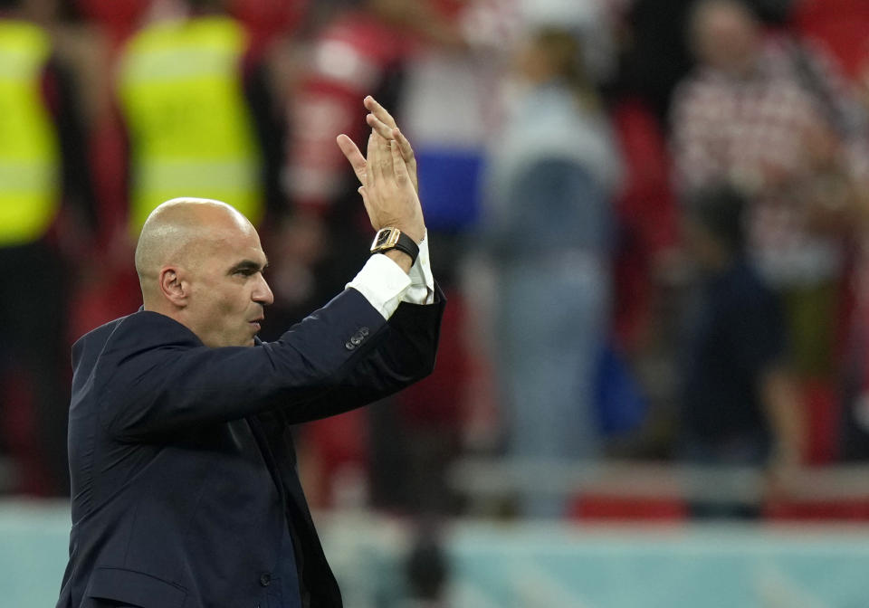 Belgium's head coach Roberto Martinez greets fans at the end of the World Cup group F soccer match between Croatia and Belgium at the Ahmad Bin Ali Stadium in Al Rayyan, Qatar, Thursday, Dec. 1, 2022. (AP Photo/Francisco Seco)