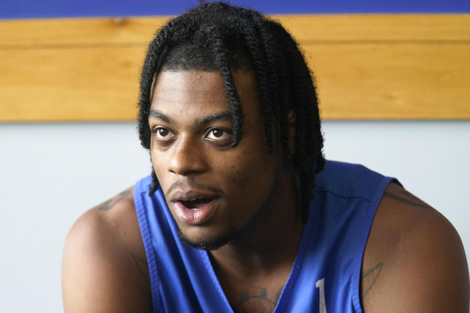 Duke guard Trevor Keels speaks with reporters during the team's NCAA college basketball media day in Durham, N.C., Tuesday, Sept. 28, 2021. (AP Photo/Gerry Broome)