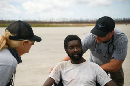 An Abaco resident is evacuated from the island at the airport in the wake of Hurricane Dorian in Marsh Harbour