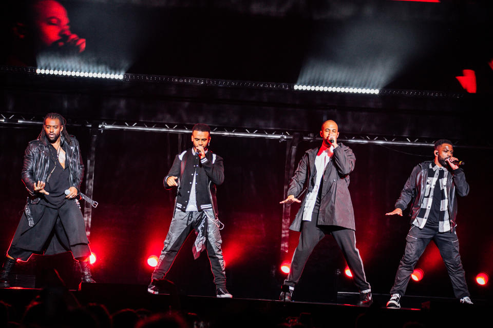 CARDIFF, WALES - OCTOBER 25: EDITORIAL USE ONLY Oritsé Williams, Aston Merrygold, JB Gill and Marvin Humes of JLS performs on stage at Motorpoint Arena on October 25, 2021 in Cardiff, Wales. (Photo by Mike Lewis Photography/Redferns)