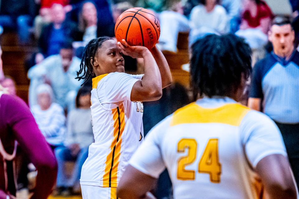 Tilton's Ahnay Adams takes the free throw.