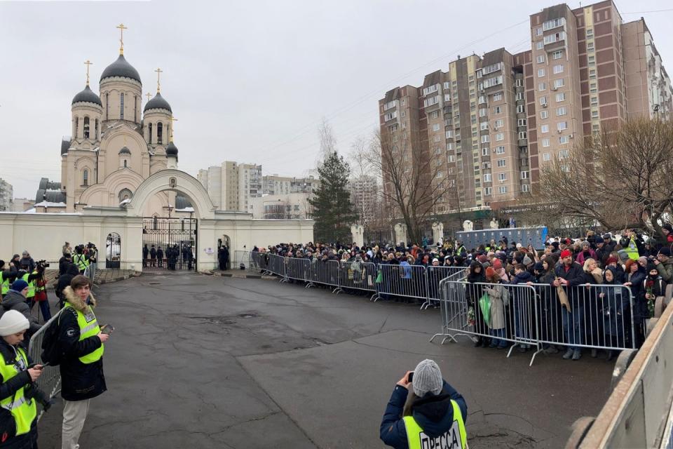 Mourners gather in front of the Mother of God Quench My Sorrows church ahead of the funeral service (AFP via Getty Images)