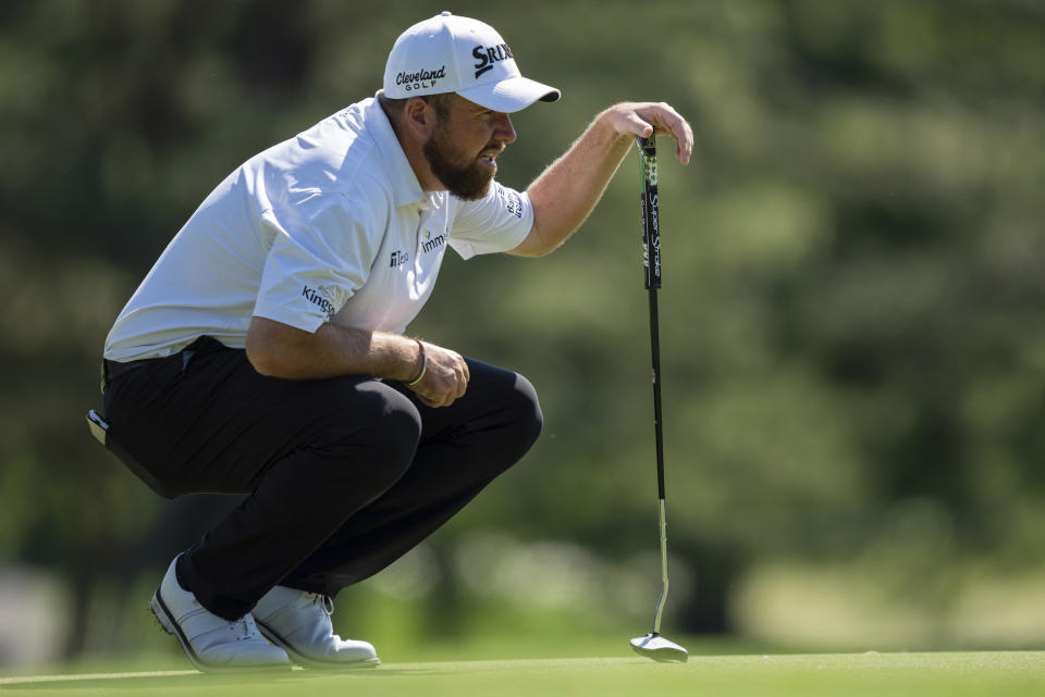 Shane Lowry lines up his putt on the 11th hole during the third round of the Wells Fargo Championship golf tournament at Quail Hollow, Saturday, May 8, 2021, in Charlotte, N.C. (AP Photo/Jacob Kupferman)