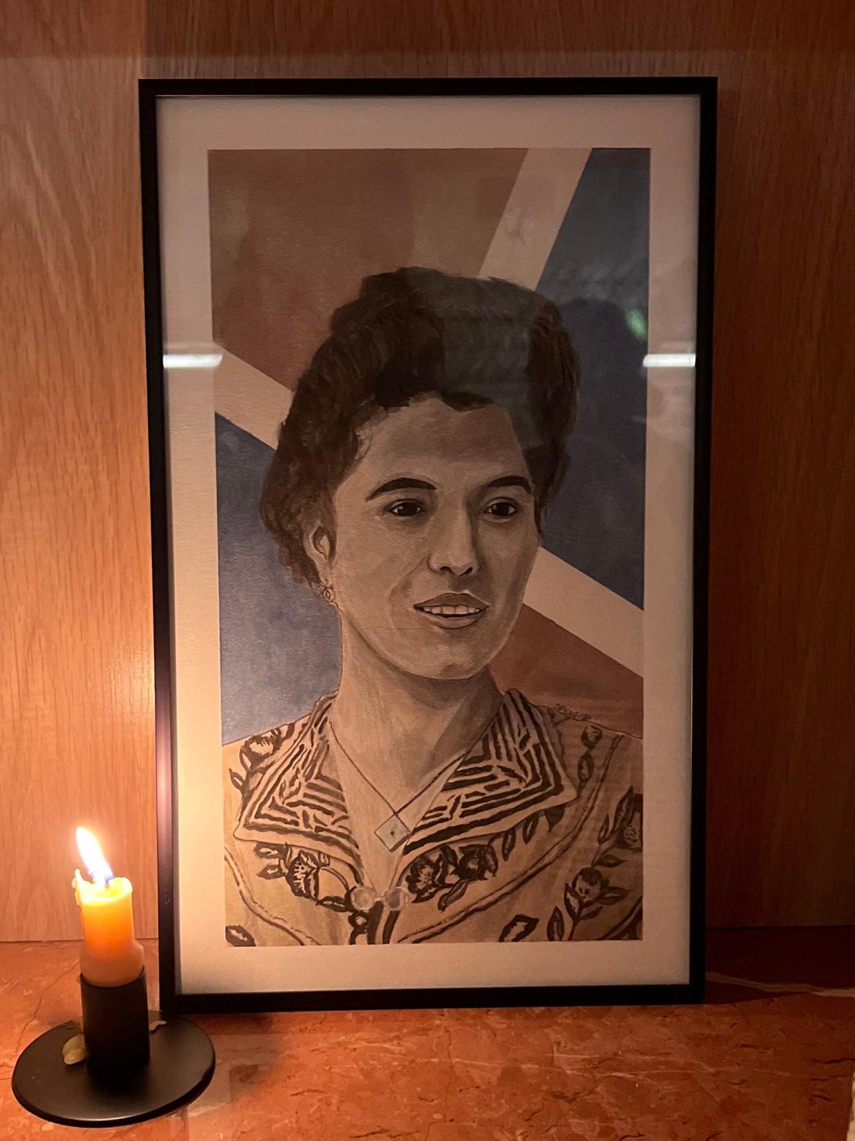 A painting of David Viana's grandmother, Isaura Sequiera, inside Lita restaurant.
