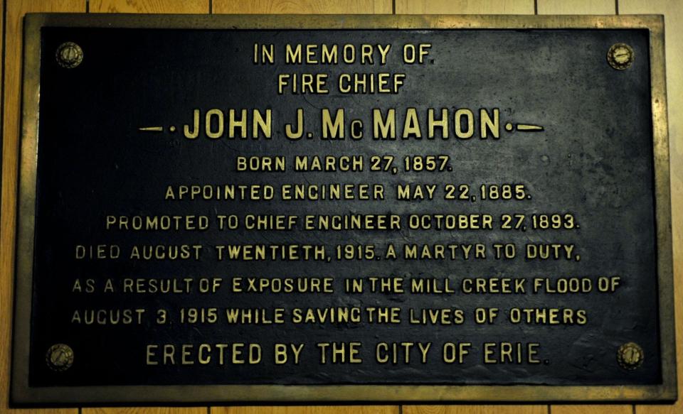 A plaque honoring Erie Fire Chief John McMahon, who died from typhoid pneumonia a few weeks after the Mill Creek Flood of Aug. 3, 1915, hangs at the Erie Firefighters Historical Museum. [ETN]
