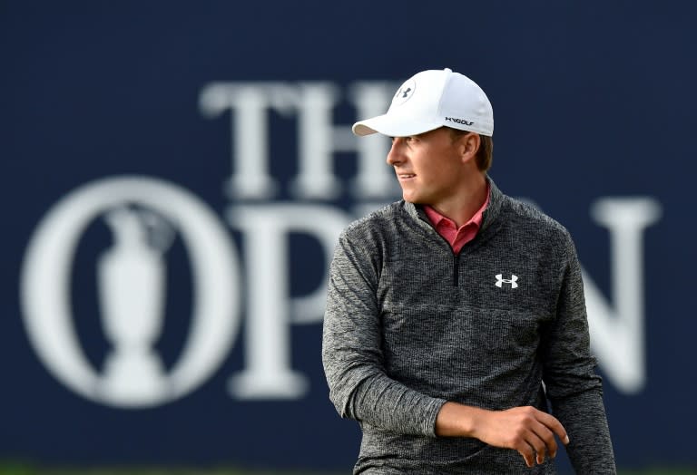 US golfer Jordan Spieth reacts on the 18th green after his third round on day three of the Open Golf Championship at Royal Birkdale golf course near Southport in north west England on July 22, 2017