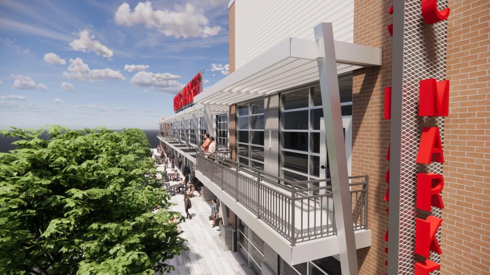 A rendering of the proposed Green Bay Public Market, currently the Old Fort Square building at 211 N. Broadway in Green Bay, illustrating the second floor balcony.