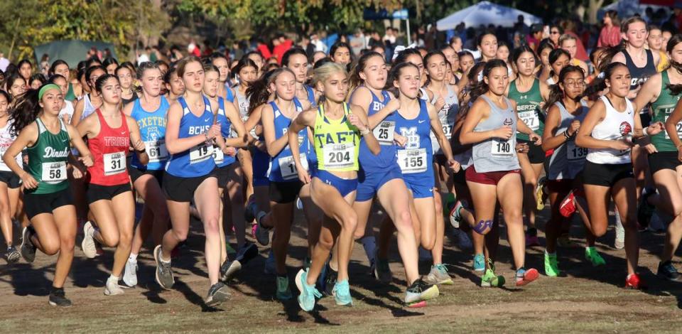 The girls Division IV race was the largest of the races at the CIF Central Section cross country championships at Woodward Park on Nov. 16, 2023.