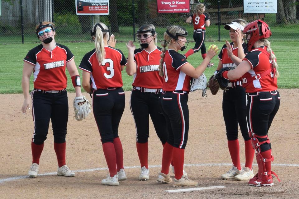 Eastern Greene softball exchanges high fives before the start of an inning during the Thunderbirds' loss to Owen Valley. (Seth Tow/Herald-Times)