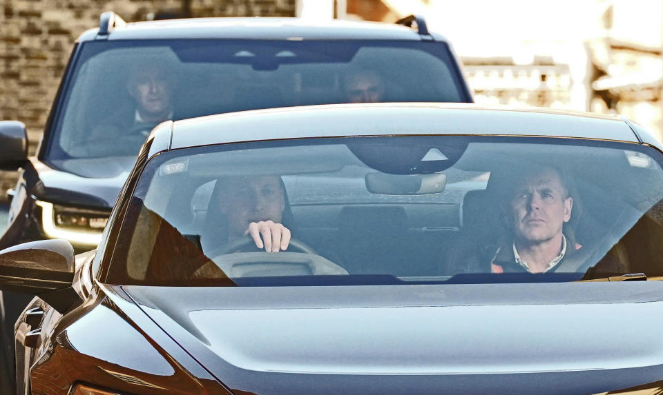 Britain's Prince William, left, drives away from the London Clinic, in central London, where Kate, the Princess of Wales is recovering after undergoing successful abdominal surgery, Thursday Jan. 18, 2024. (Lucy North/PA via AP)