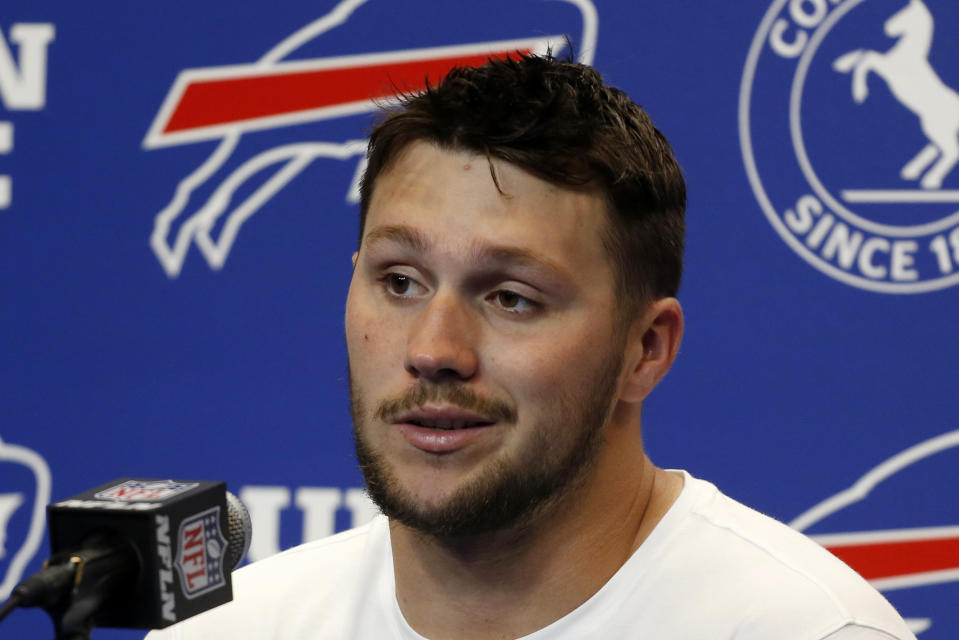 Buffalo Bills quarterback Josh Allen meets with reporters following a 23-16 loss to the Pittsburgh Steelers in an NFL football game in Orchard Park, N.Y., Sunday, Sept. 12, 2021. (AP Photo/Joshua Bessex)