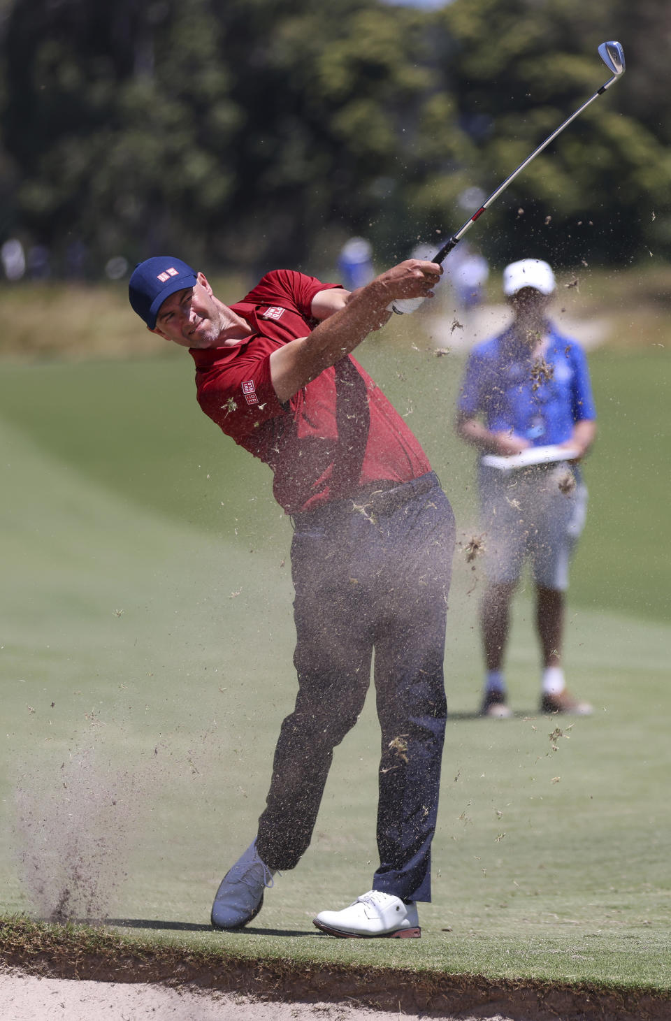 Australia's Adam Scott plays an approach shot on the sixth hole during the Australian Open golf championship at Victoria golf course in Melbourne, Australia, Friday, Dec. 2, 2022. (AP Photo/Asanka Brendon Ratnayake)