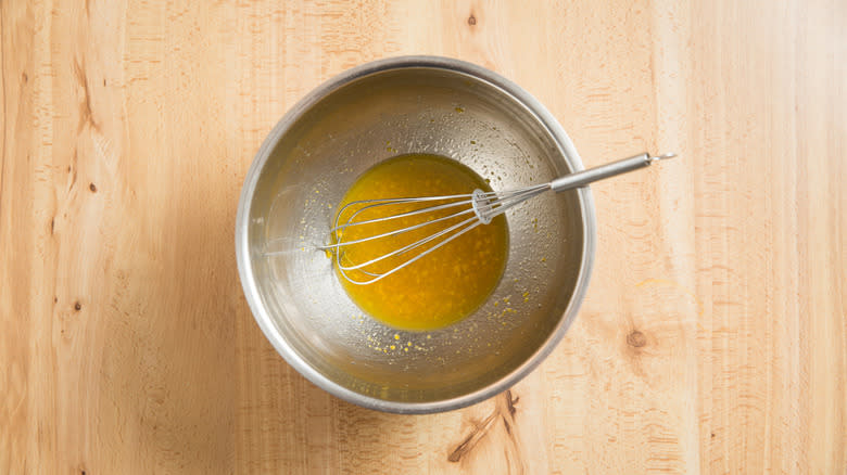 orange vinaigrette in mixing bowl 