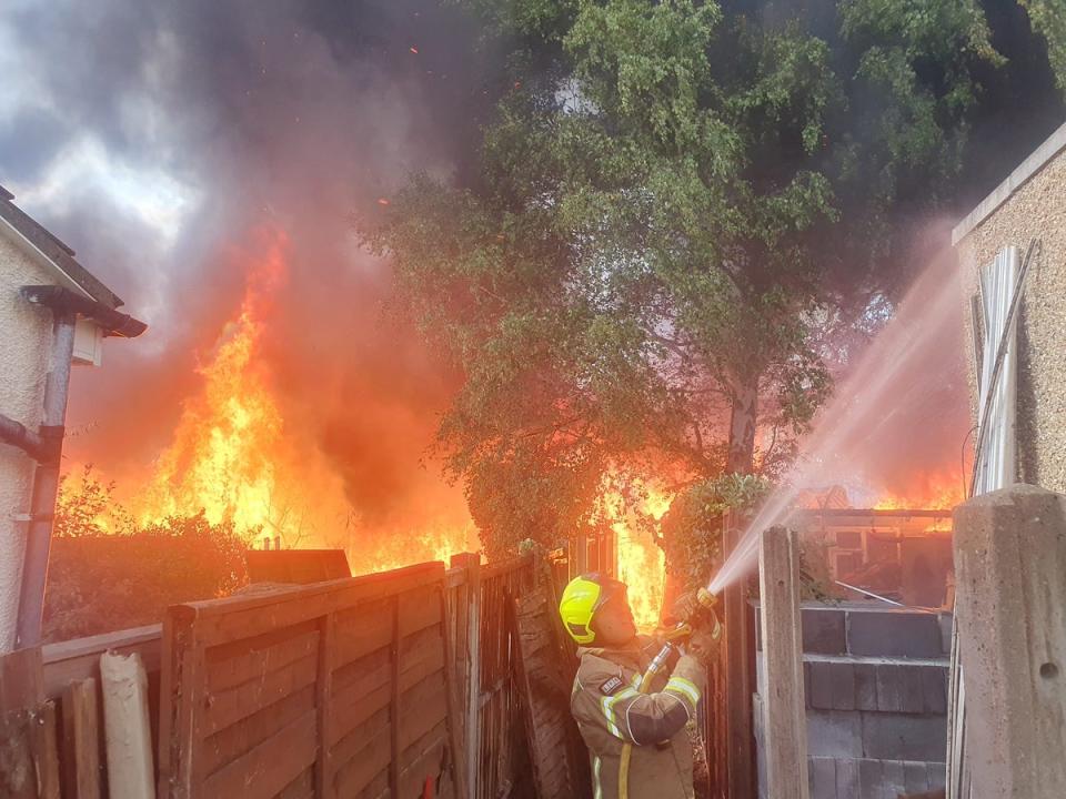 A firefighter takes on the roaring flames in Hounslow (LFB)