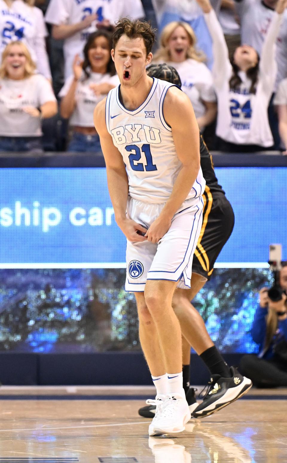 Brigham Young Cougars guard Trevin Knell (21) celebrates after a three point shot as BYU and SE Louisiana play at the Marriott Center in Provo on Wednesday, Nov. 15, 2023. | Scott G Winterton, Deseret News