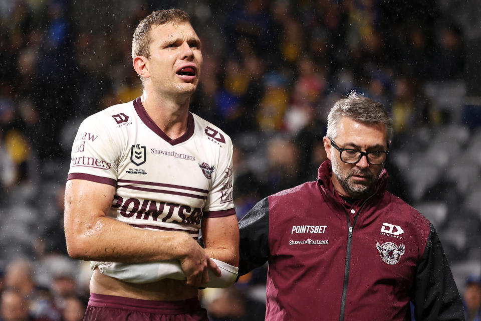 Seen here, Manly's Tom Trbojevic goes off with injury in the Sea Eagles' round 11 loss to Parramatta in 2022.