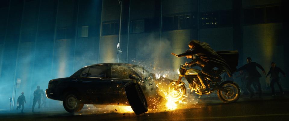 Trinity (Carrie-Anne Moss) and Neo (Keanu Reeves) hit the road in "The Matrix Revolutions."