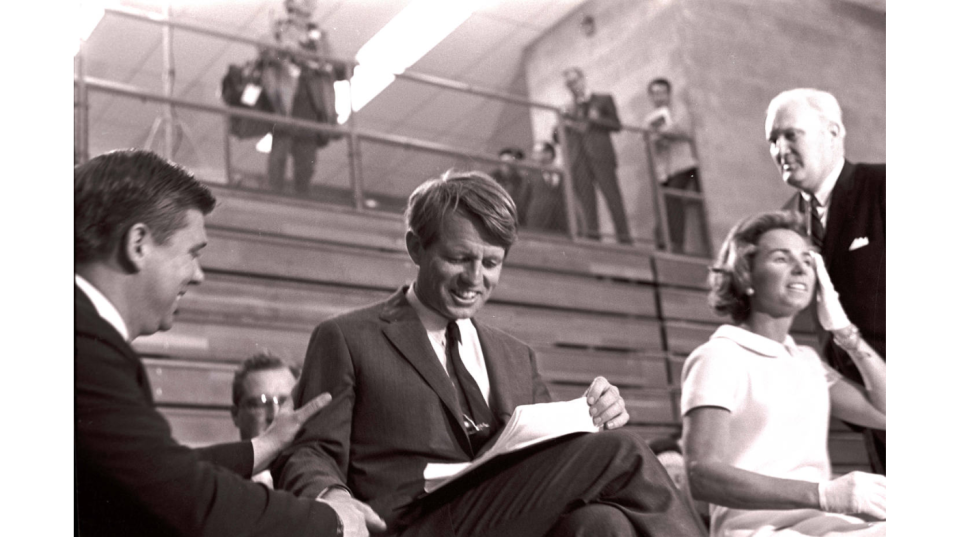 Robert F. Kennedy and his wife Ethel prepare for an appearance at Irving Gym, (then called the Men's Gym) on the campus of Ball State University, April 4, 1968. Hours later Kennedy would learn of the slaying of Martin Luther King Jr. and deliver a more famous speech from the back of a truck in an inner city neighborhood in Indianapolis.