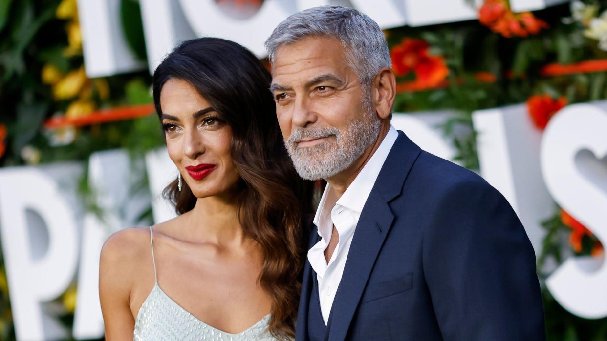 Amal Clooney and George Clooney attend the World Premiere of 