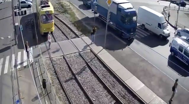 woman has lost her leg after stepping out in front of a tram while texting on her mobile phone. Photo: LiveLeak