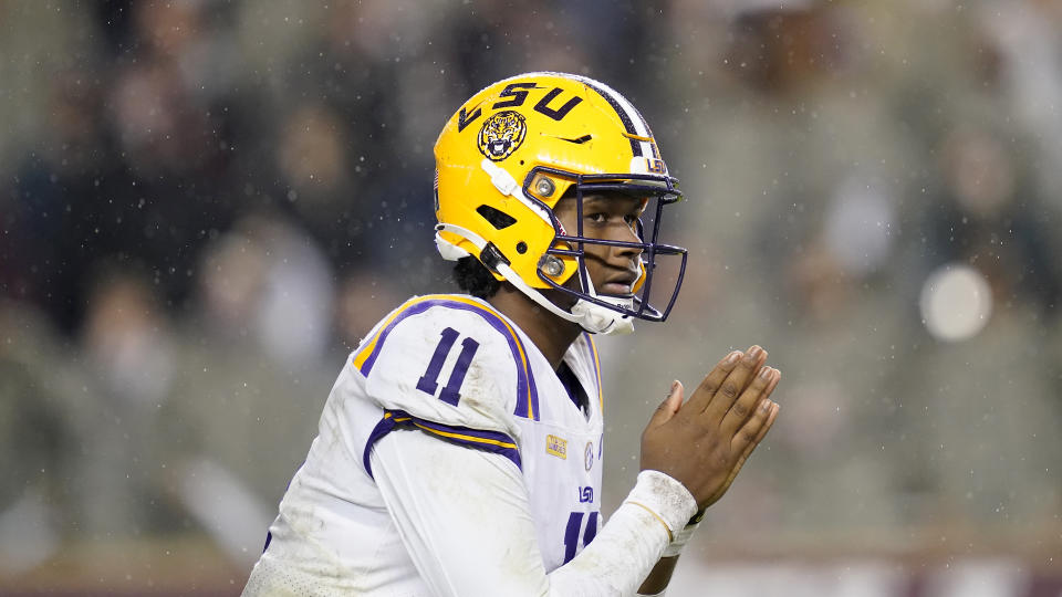 LSU quarterback TJ Finley (11) takes a snap against Texas A&M during the first half of an NCAA college football game, Saturday, Nov. 28, 2020. in College Station, Texas. (AP Photo/Sam Craft)