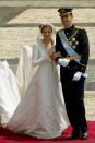 <p>Letizia Ortiz chose a modern-collared gown with a 14-foot train for her wedding to Prince Felipe of Spain.</p><br>