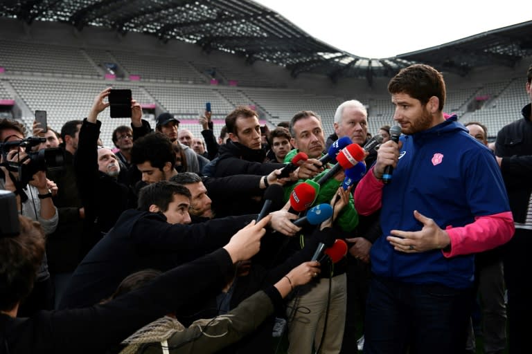 Stade Francais Paris' French lock Pascal Pape (R) speaks to journalists on March 13, 2017 at the Stade Jean Bouin in Paris