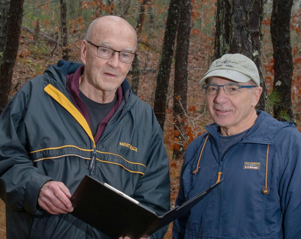 Orleans Historical Commission chair Ronald Peterson, left, and Ed Marcarelli at the Peck Property in East Orleans. The area was the site of an archeological survey last fall.